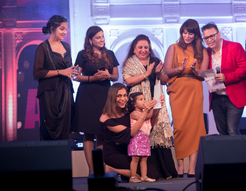 "ICWF 2024 in Jaipur: Colorful booths showcasing wedding trends, with planners networking and attending workshops"