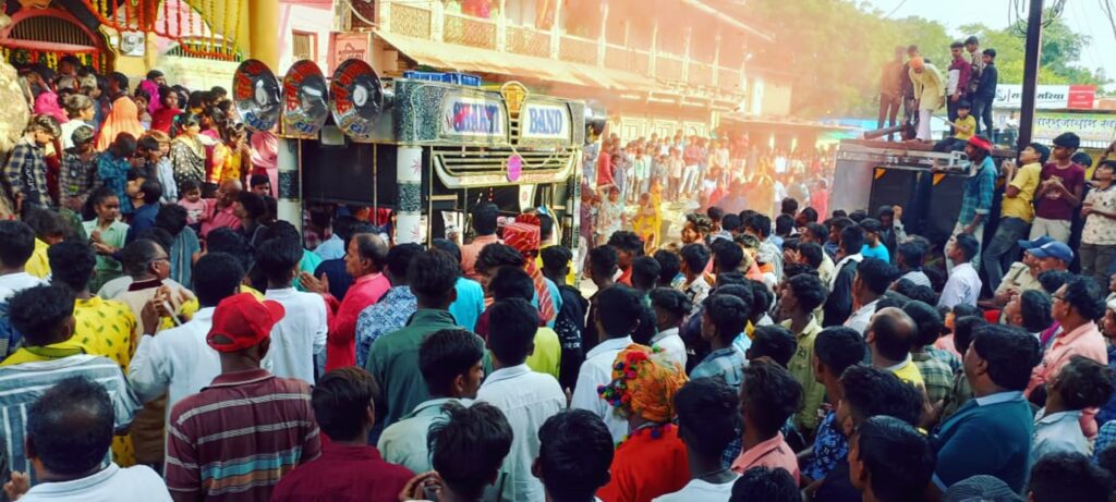 "Colorful Jal Jhulni Dol Gyaras Utsav celebration in Alirajpur, showing water worship and festive procession"