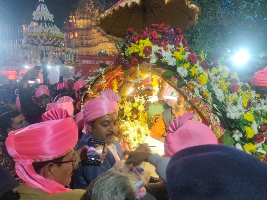 "Colorful Dhol Gyaras Jal Vihar procession in Orchha, with Lord Ram's statue carried to the river amidst music and celebrations"