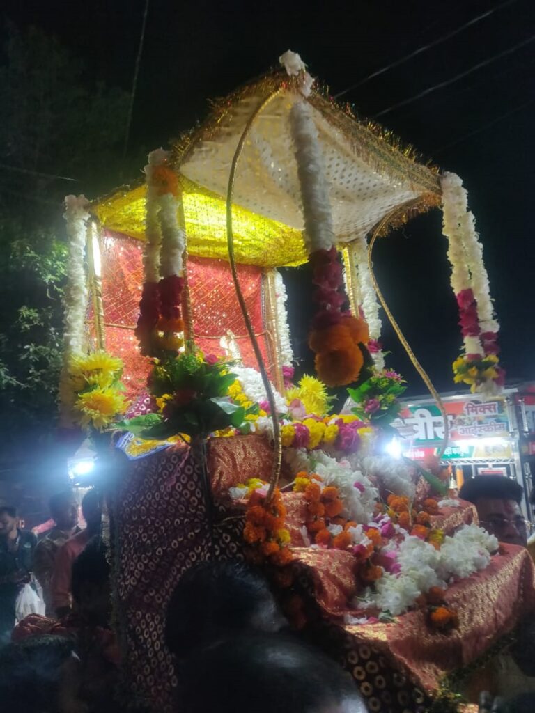 "Colorful Dhol Gyaras Jal Vihar procession in Orchha, with Lord Ram's statue carried to the river amidst music and celebrations"