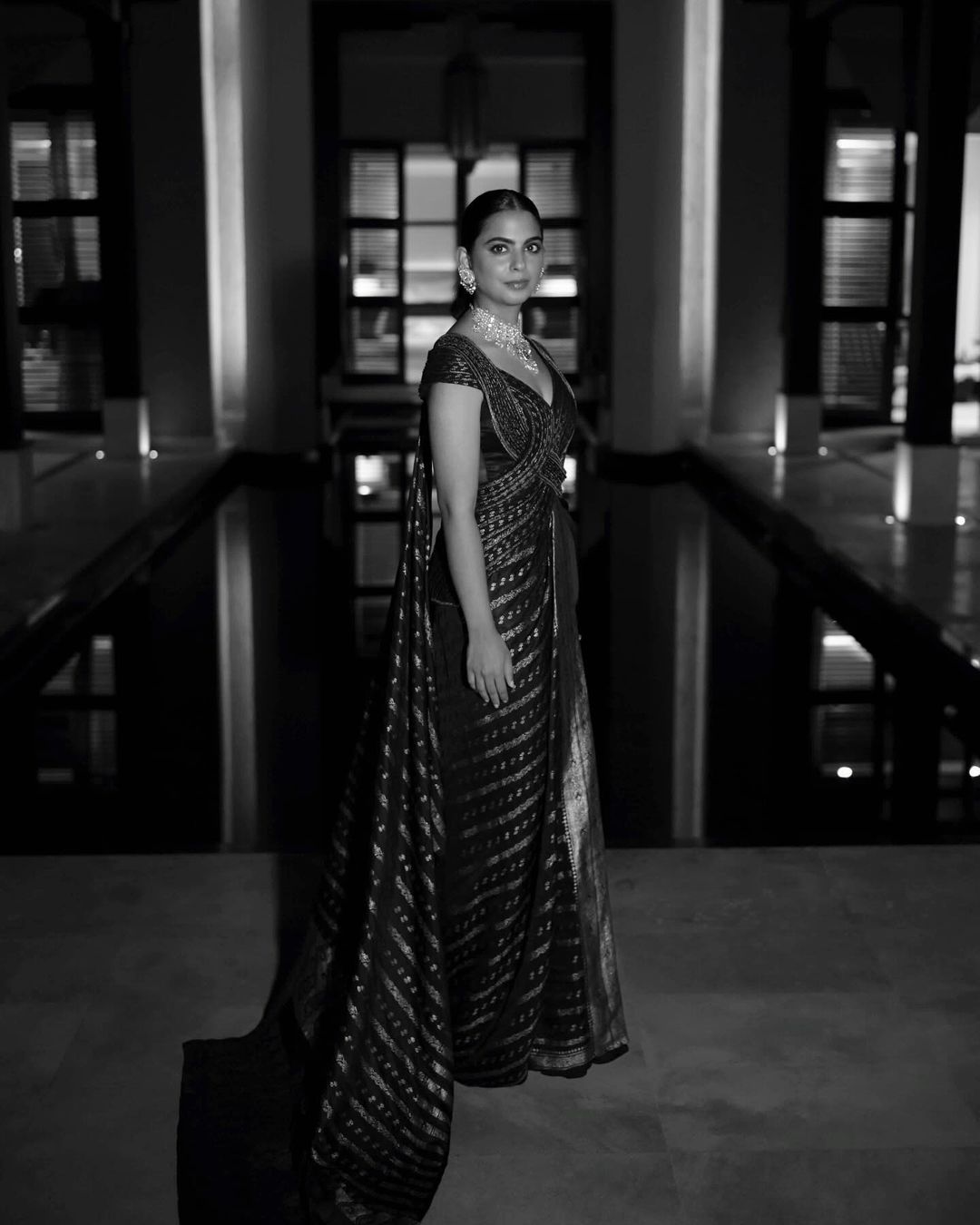 Isha Ambani dazzles in unique saree gown styled with statement diamond jewellery set, her dress is especially made of…
