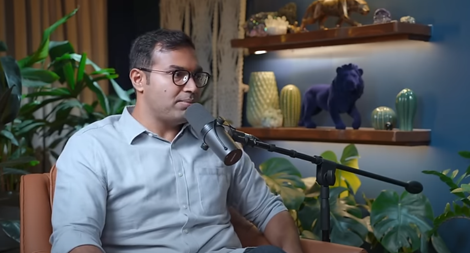 Who is Ajitesh Korupolu? discussing real estate investment strategies with Ranveer Allahbadia in a podcast.