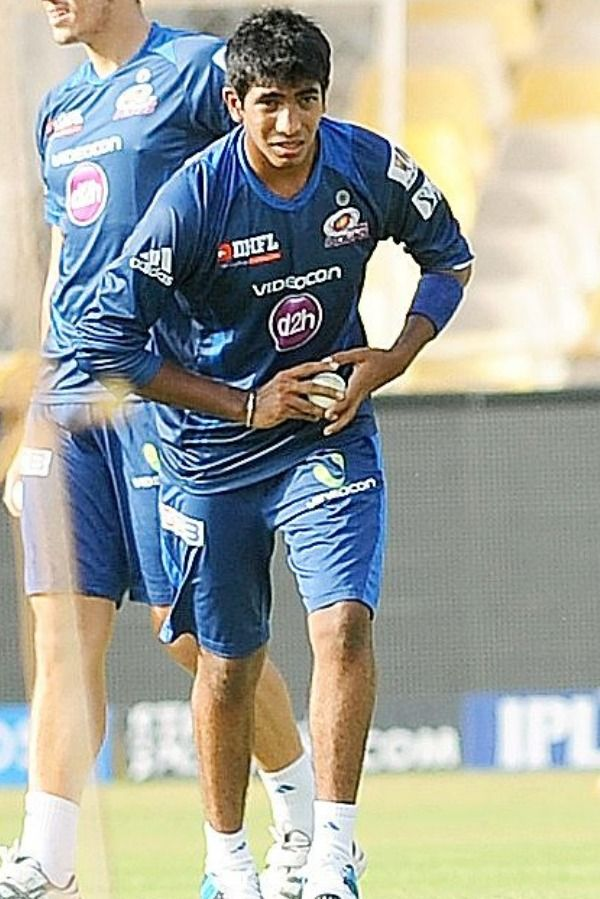 Jasprit Bumrah is a man of few words, but his shaved head speaks volumes. His bold decision to keep his head completely shaved has been both stylish and practical, helping him maintain his focus and on-field intensity.